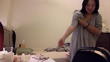 Sultry Asian Milf Slowly Slips Into Her Silk And Lace