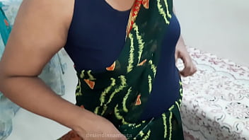 Sultry Desi Bhabhi Draped In A Dark Green Saree, Teasing And Tempting With Every Curve